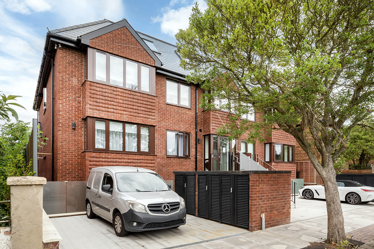 A modern new build house on a North London street among period properties